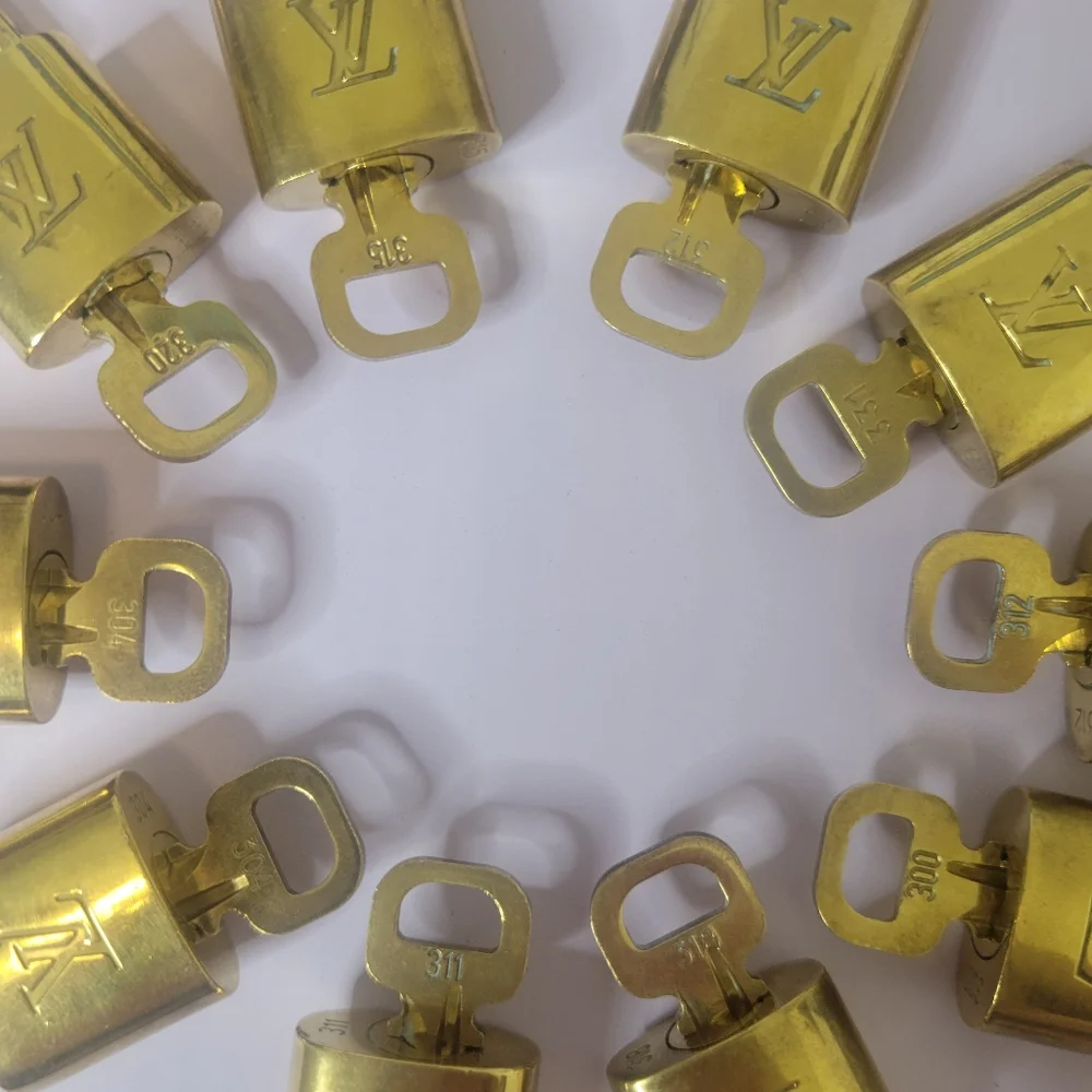 Louis Vuitton Lock & Key in Mint Condition, sold indivually - Picture 6 of 6